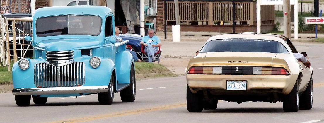 Vintage cars fill the city streets