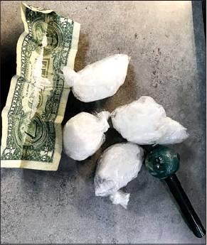 Pictured are the 58.6 grams of meth and crack pipe seized during a traffic stop. ( Courtesy photo)