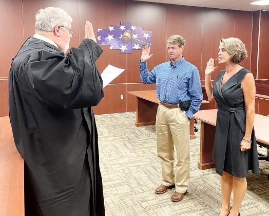 Joe Anderson and Heather McCarty are sworn in by Judge Bob Hughey