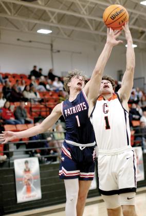 Brendon Voss battles for a rebound with a Southwest Covenant player
