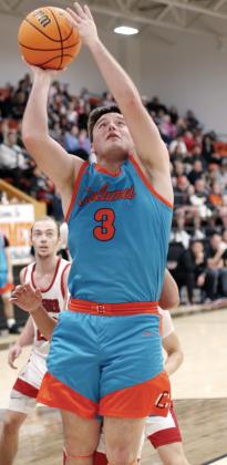 Dalton Belcher shoots in the Chieftains regional playoff game with Dover