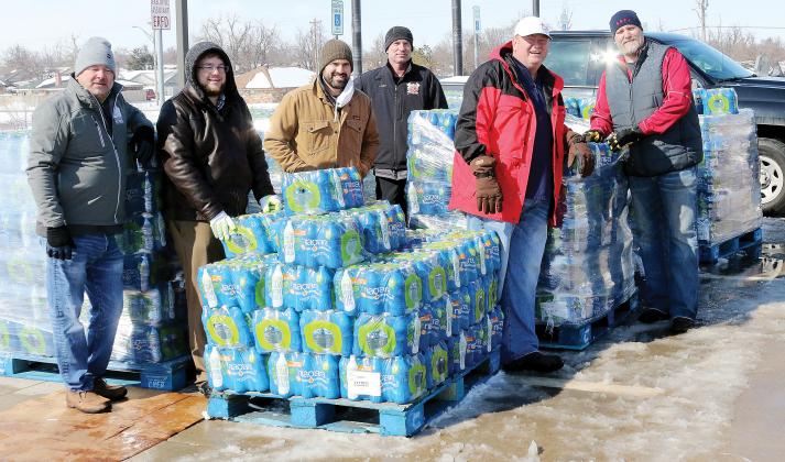 The city of El Reno handed out cases of water to residents
