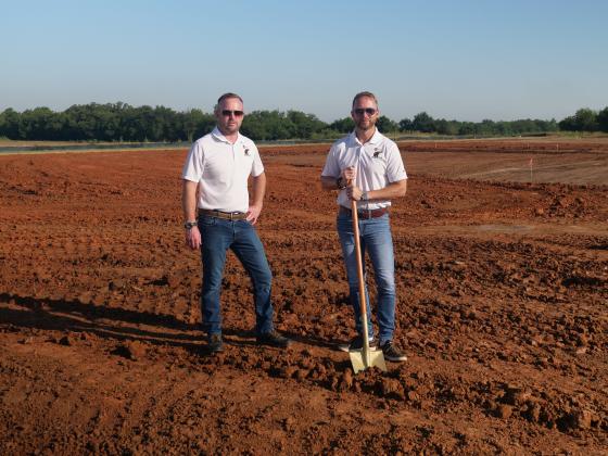 Patrick and Andrew Dougherty held a groundbreaking ceremony on the site of their new DFM center