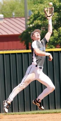 Gavin Tinsley leaps to make an over the shoulder catch behind second base