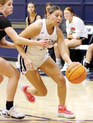 Emmary Elizondo is fouled on a drive near the three-point line