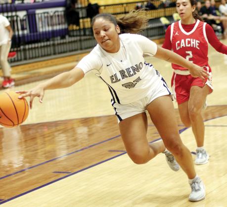 Pauline Black-Harmon reaches out to try and snag a fastbreak pass