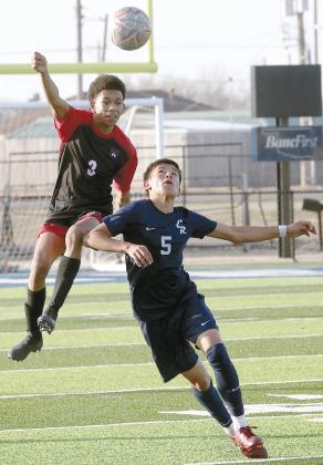 A Tuttle player leaps over the back of EHS’ Diego Reyes