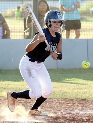 Sarah Hernandez takes off toward first base after dropping down a bunt