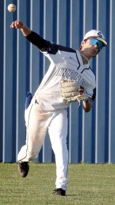 Austin Castanon makes a throw from the outfield
