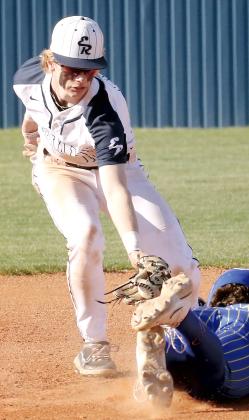 Gavin Tinsley reaches out to tag a Piedmont runner at second base