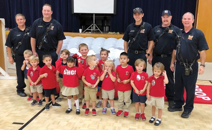 Sacred Heart preschoolers with El Reno firefighters