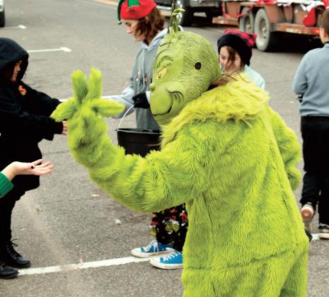 The Grinch was one of the characters to walk in last year’s Christmas parade