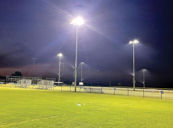 Newly installed LED lights shine down on the football and baseball fields at the Ashbrook Complex
