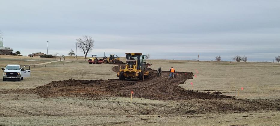 Dirt work is under way on a new trail at Lake El Reno