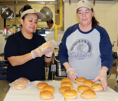 ERPS cafeteria workers Rosas and Bechtel sack up sandwiches