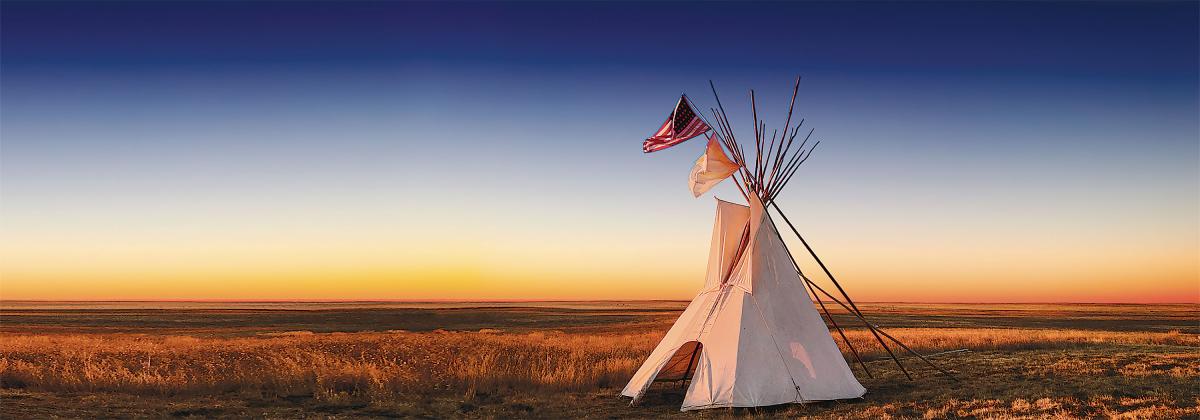 Sunset over a teepee constructed on the site of the Sand Creek Massacre