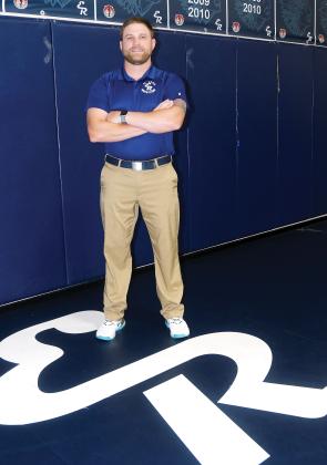 Anthony McDonald was promoted to head wrestling coach last week 