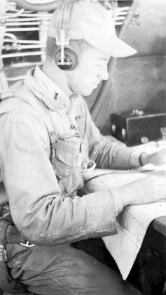 Leslie Roblyer at his station, the navigator’s table in the nose of a B-17