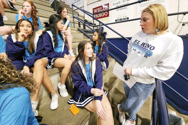 Jacqueline Smith chats with her cheerleaders