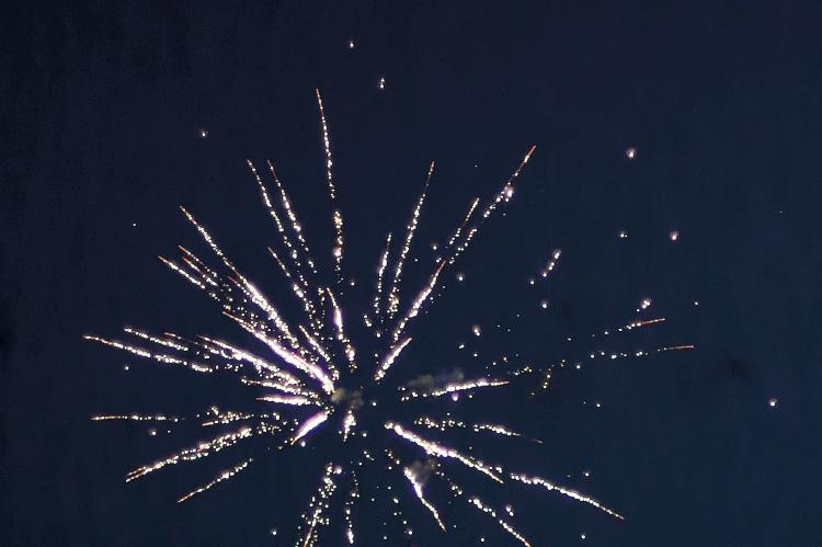 One of the opening bursts of the city's fireworks display at Lake El Reno.