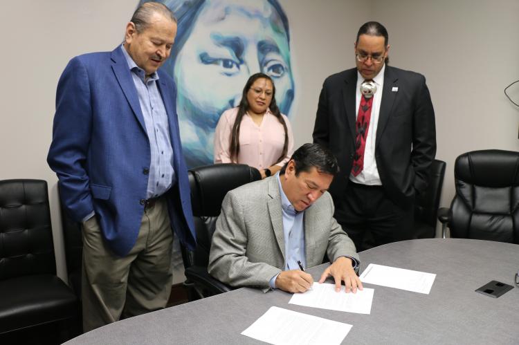 Gov. Reggie Wassana signs documents placing land in Geary into trust