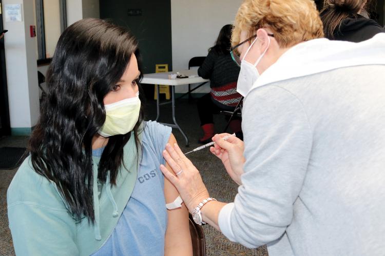 Meagan Bridsfort gets a COVID-19 vaccine