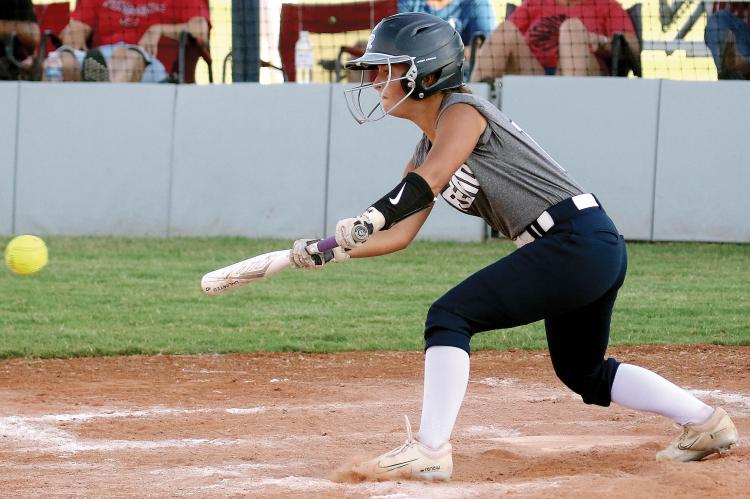 Izzy Choate drops down a bunt