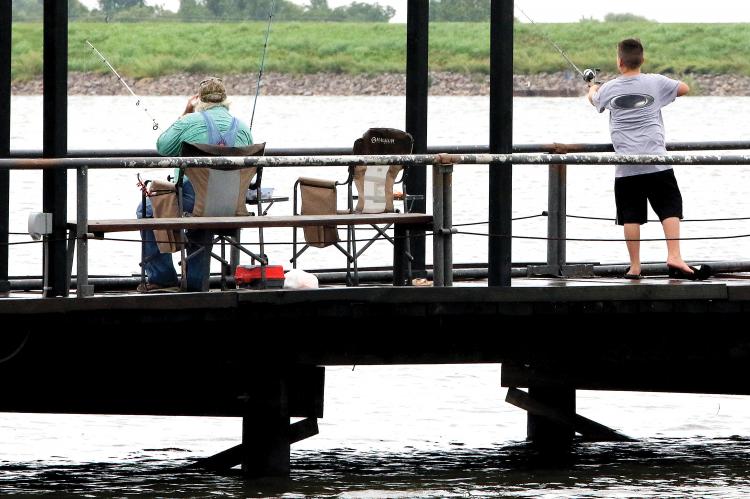 Visitors to Lake El Reno fished off the main west-side pier