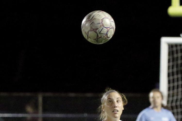 Caroline Huber chases down the ball during a match