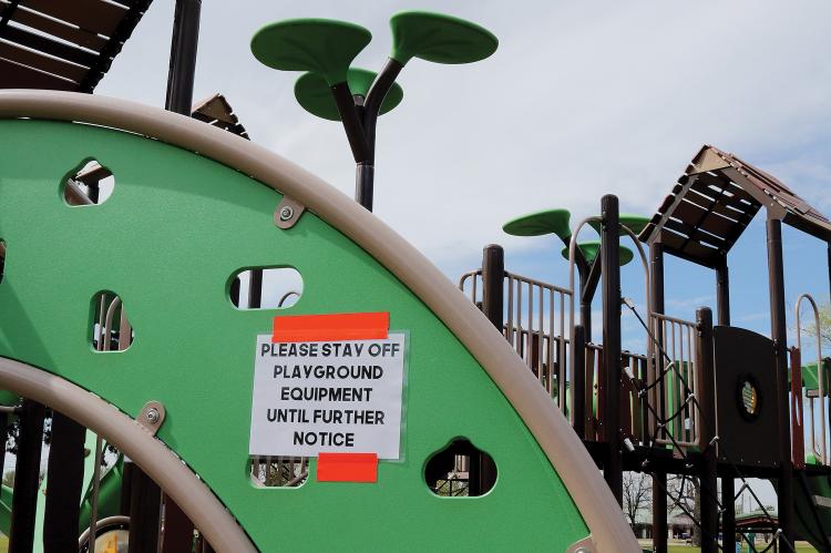 Signs have been posted on all city-owned playground equipment