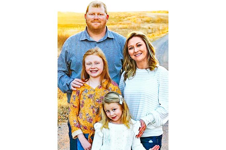 Luke and Lacey Scott with daughters Autumn and Ellie