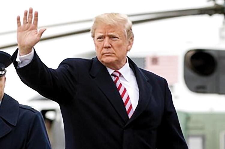 President Donald Trump waving