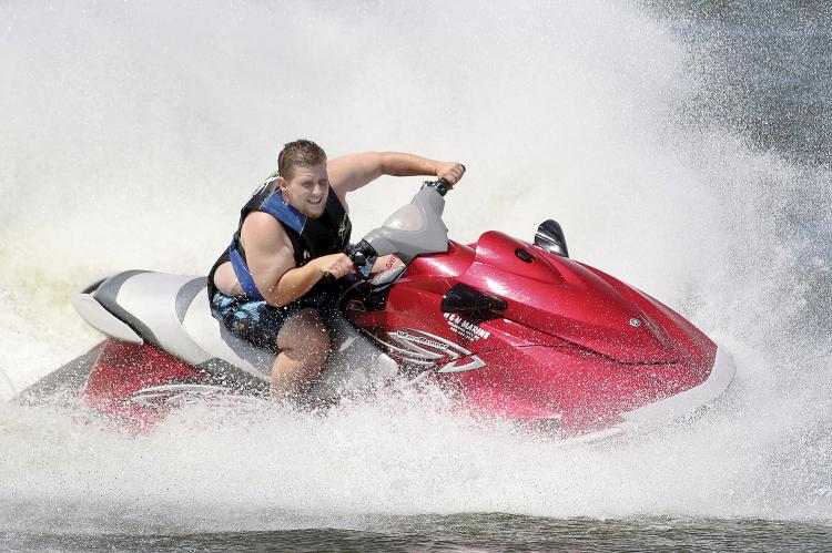 Chrys Cofran makes a hard turn on his watercraft