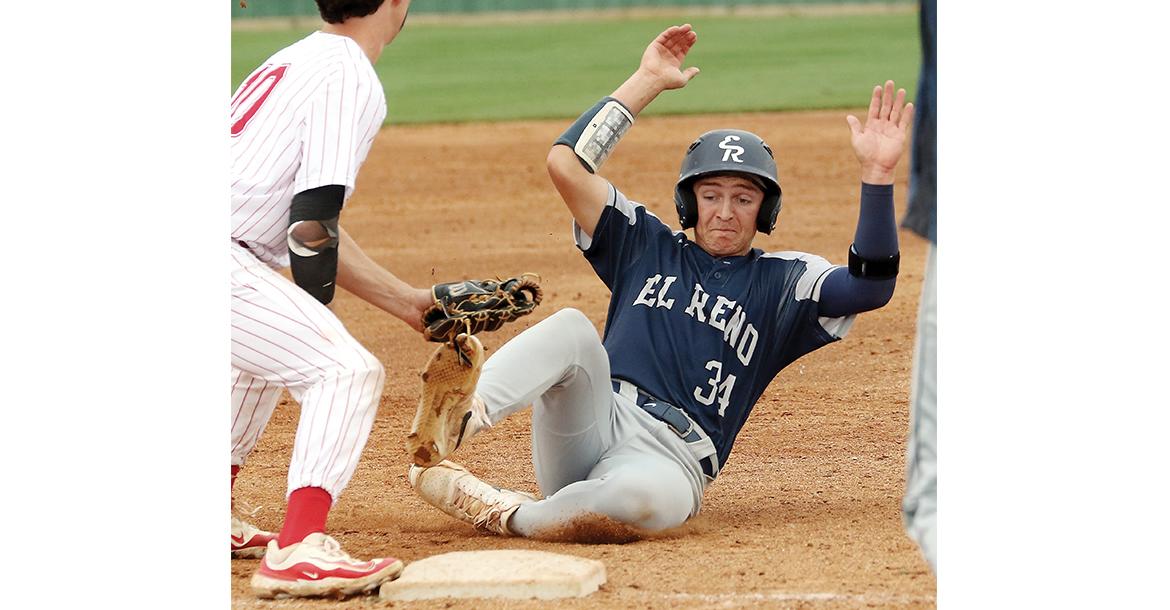 Mason Fulton slides into third under a fake tag attempt by a Duncan infielder_slideshow